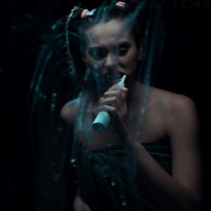 Alissa brushing her teeth