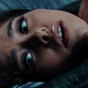 Tentacles grabbing her neck