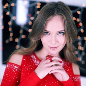 Stella looking lovely in red dress