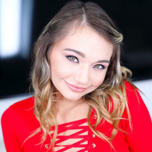 With a beautiful smile