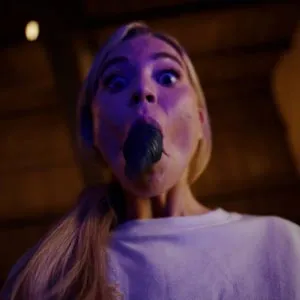 Alien parasite jumps on her