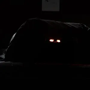 Glowing eyes under the blanket