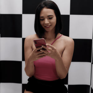 Eve Sweet checking her messages