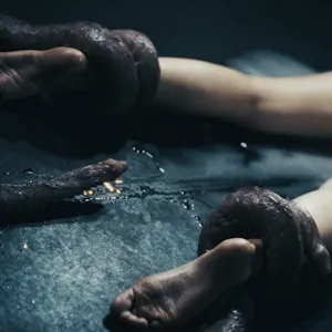 But she gets tied down by huge tentacles