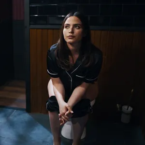 Sitting on the toilet