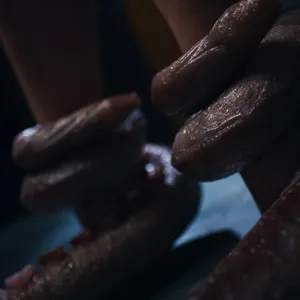 Holding her firm in place