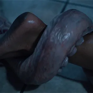 Her legs are grabbed