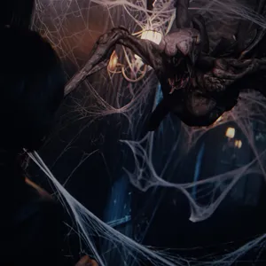The spider like creature is waiting for her