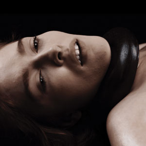 Tentacle wrapping around her neck