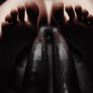 Tentacles crawling up her legs