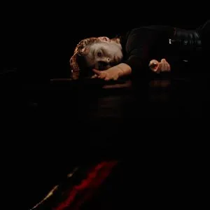 Black tentacles approaching Kelly Collins