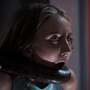 Macy Meadows grabbed by a big black tentacle