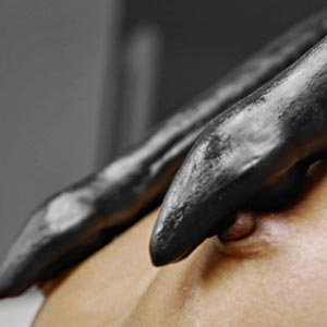 Tentacles crawling over her nipples