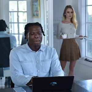 Natalie serves her boss