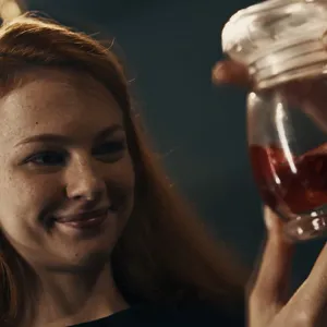 She looks satisfied at first