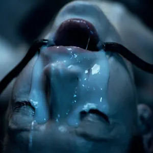 Stretching her pretty mouth more