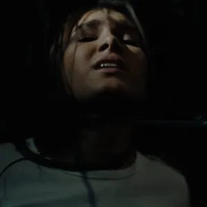 Ellie Luna between vines