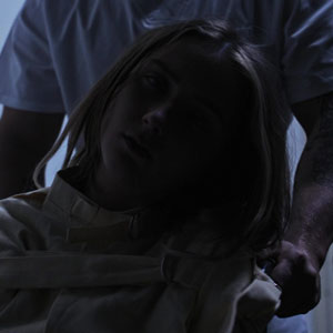 Macy in a wheelchair