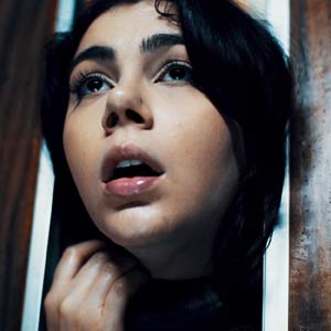 Her head gets stuck in the door