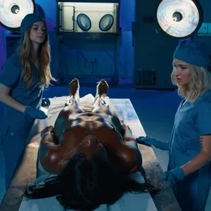 Mortuary assistants getting the client ready