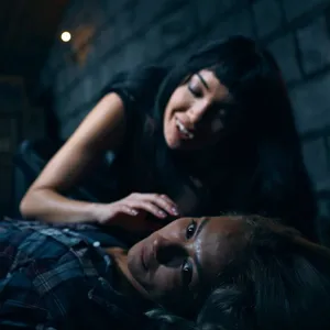 Draining blood from her victim