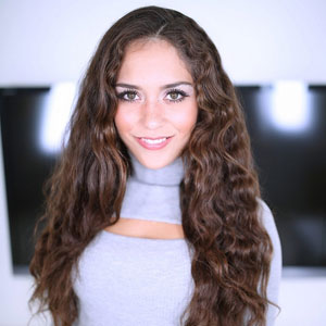 Curly beauty Ziggy Star smiles for camera